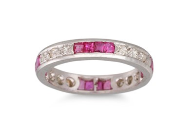 Lot 207 - A RUBY AND DIAMOND ETERNITY RING, mounted in...