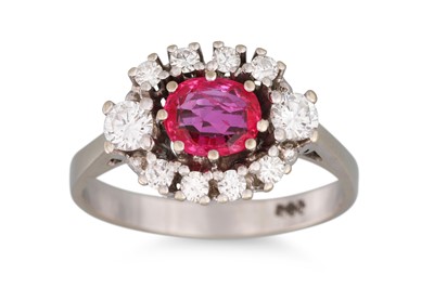 Lot 129 - A RUBY AND DIAMOND CLUSTER RING, the brilliant...