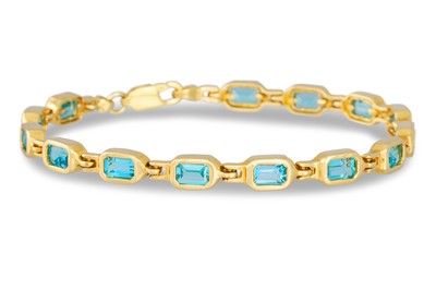 Lot 131 - A TOPAZ SET BRACELET, the rectangular stones...