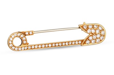 Lot 132 - A DIAMOND SET BROOCH, modelled as a safety pin,...