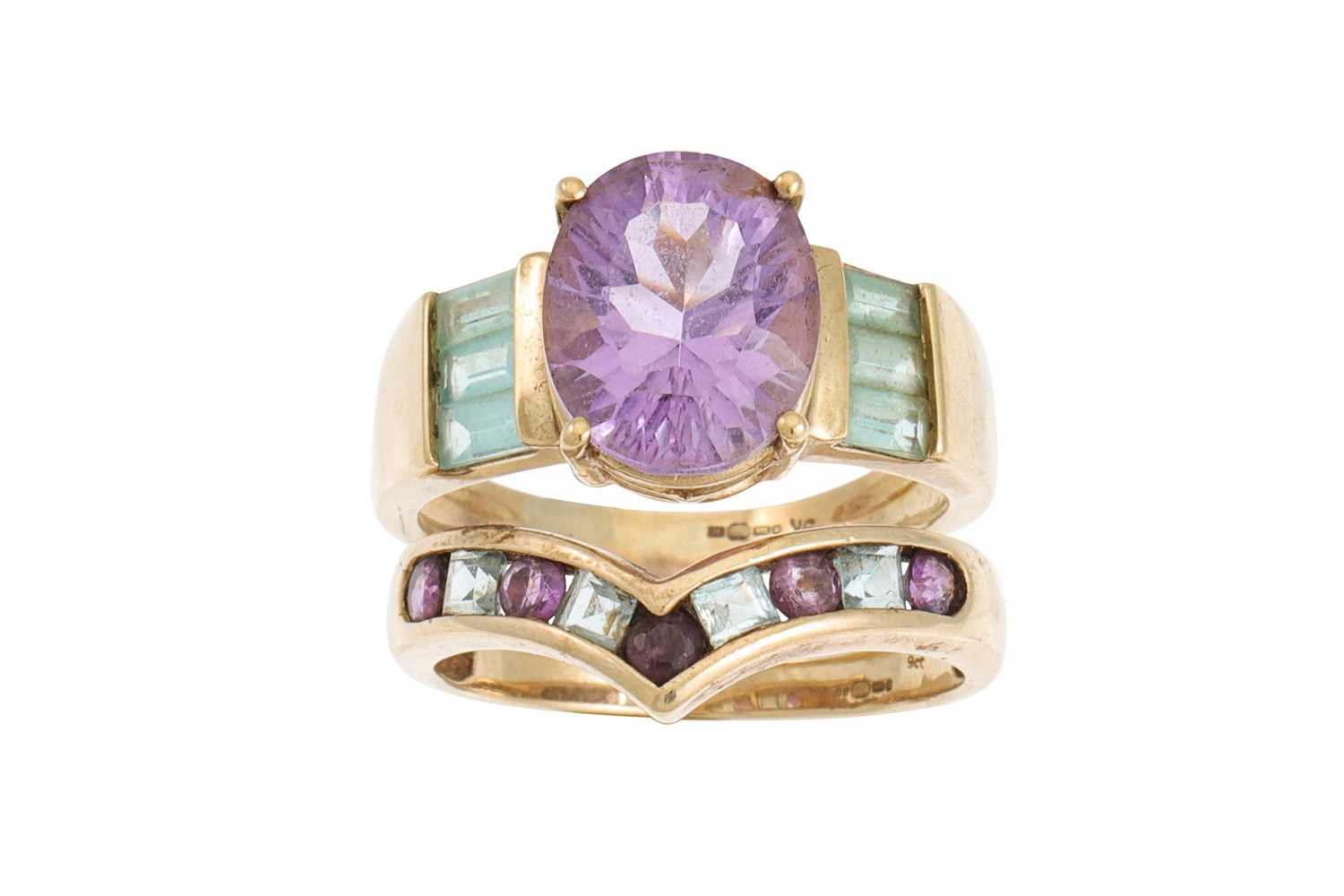 Lot 12 - AN AMETHYST AND TOPAZ RING, mounted in 9ct...