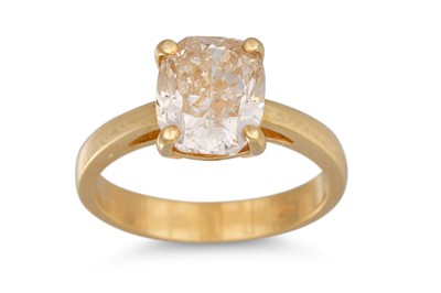 Lot 153 - A DIAMOND SOLITAIRE RING, the fancy brown...