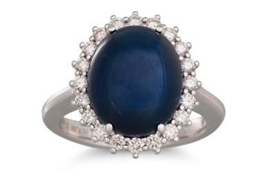 Lot 156 - A CABOCHON SAPPHIRE AND DIAMOND CLUSTER RING,...