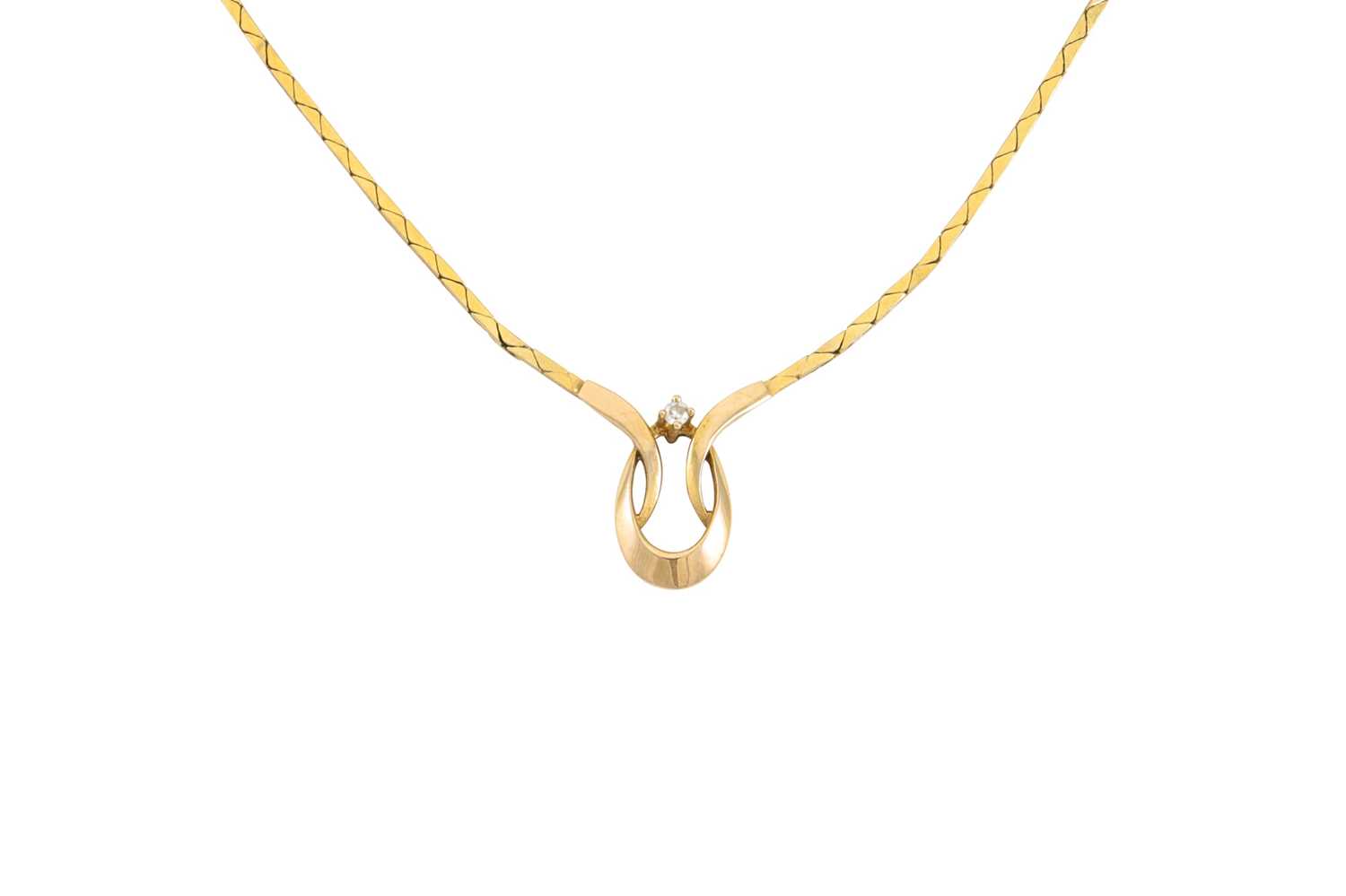 Lot 15 - A 9CT GOLD NECKLACE, set with a diamond