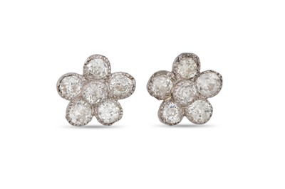 Lot 93 - A PAIR OF DIAMOND DAISY CLUSTER EARRINGS, set...