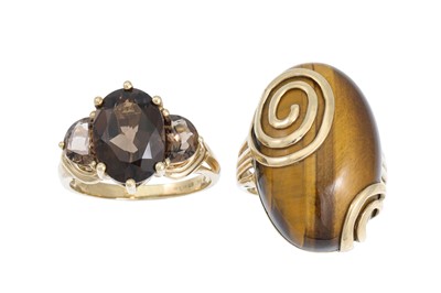 Lot 17 - A TIGER'S EYE RING, mounted in 9ct gold,...