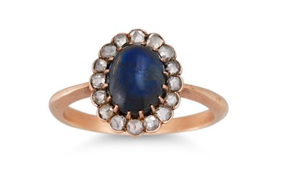 Lot 225 - A DIAMOND AND SAPPHIRE CLUSTER RING, the...