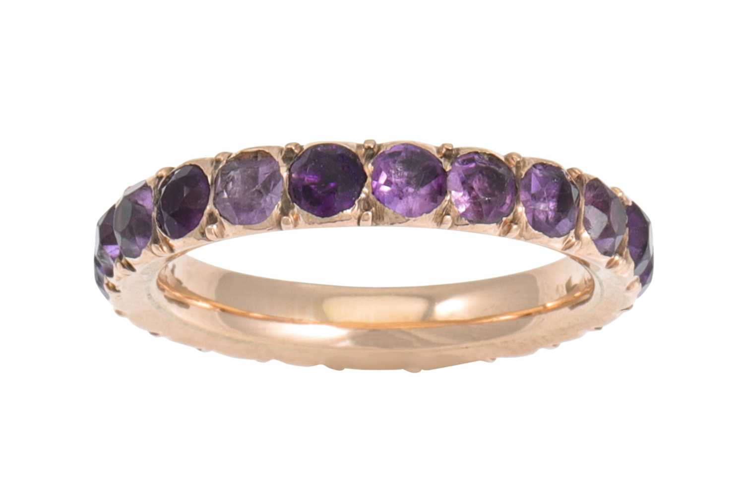 Lot 92 - AN ANTIQUE AMETHYST SET ETERNITY RING, mounted...