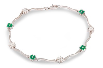 Lot 337 - AN EMERALD AND DIAMOND CLUSTER BRACELET,...