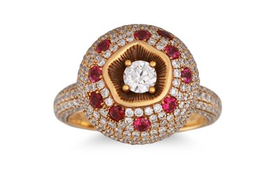 Lot 243 - A DIAMOND AND RUBY BOMBÉ CLUSTER RING, pavé...