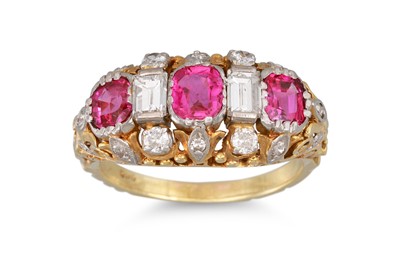 Lot 166 - A RUBY AND DIAMOND RING, cushion cut rubies to...