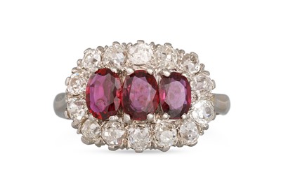 Lot 168 - A RUBY AND DIAMOND CLUSTER RING, the three...