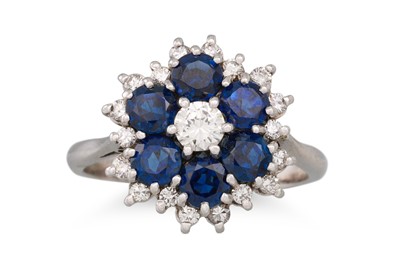 Lot 169 - A SAPPHIRE AND DIAMOND CLUSTER RING, of...