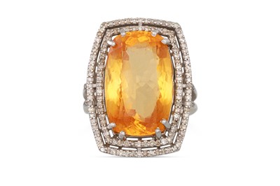 Lot 145 - A CITRINE AND DIAMOND CLUSTER RING, the...