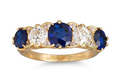 Lot 210 - A FIVE STONE DIAMOND AND SAPPHIRE RING, the...