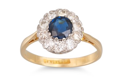 Lot 213 - A SAPPHIRE AND DIAMOND CLUSTER RING, the...