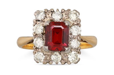 Lot 214 - A GARNET AND DIAMOND CLUSTER RING, the...