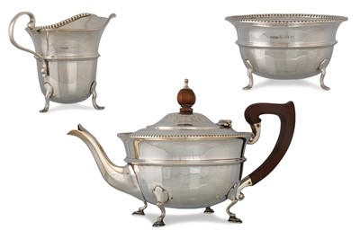 Lot 472 - A GEORGE V SILVER THREE-PIECE TEA SET, of...