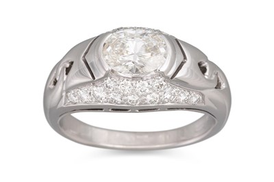 Lot 153 - A DIAMOND RING, the oval diamond to pavé...