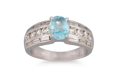 Lot 217 - A BLUE TOPAZ AND DIAMOND DRESS RING, to round...