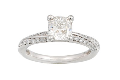 Lot 63 - A DIAMOND SOLITAIRE RING, the cushion modified...