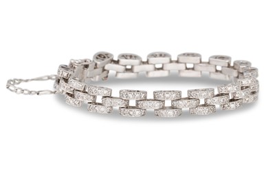 Lot 430 - A DIAMOND SET BRICK LINK BRACELET, in 18ct...