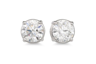 Lot 365 - A PAIR OF DIAMOND STUD EARRINGS, the brilliant...