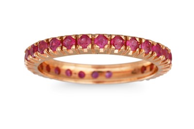 Lot 277 - A RUBY ETERNITY RING, mounted in 18ct yellow...
