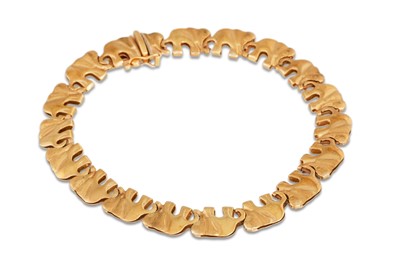 Lot 349 - A 9CT GOLD BRACELET, the links modelled as...