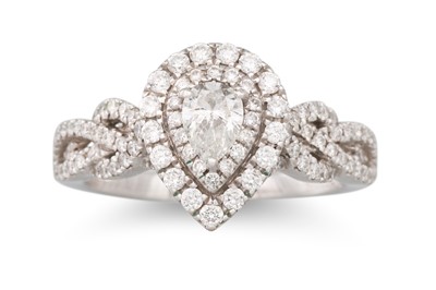 Lot 393 - A DIAMOND CLUSTER RING, the pear shaped...