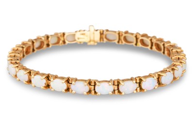 Lot 208 - A 14CT GOLD AND OPAL SET LINE BRACELET, set...