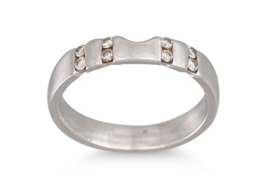 Lot 387 - A DIAMOND SET SHAPED BAND, in 18ct white gold,...