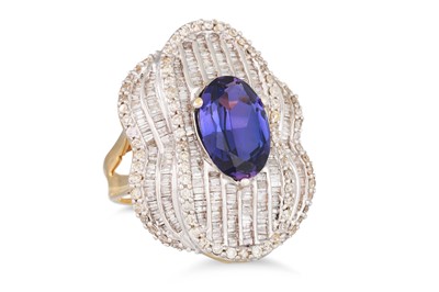 Lot 48 - A DIAMOND AND AMETHYST RING, mounted in yellow...