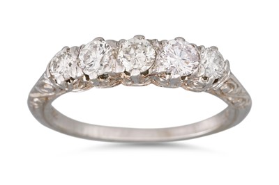 Lot 146 - A DIAMOND FIVE STONE RING, mounted in white...