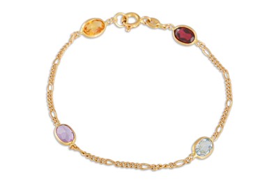 Lot 169 - A MULTI GEM SET BRACELET, in 18ct gold, set...