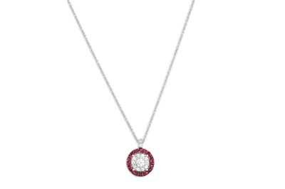 Lot 182 - A DIAMOND AND RUBY CLUSTER, of circular form,...