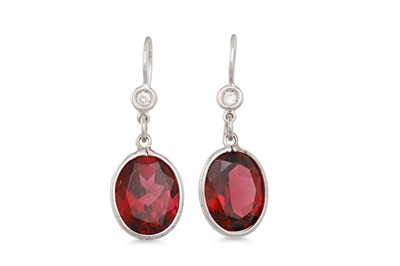 Lot 235 - A PAIR OF GARNET DROP EARRINGS, the oval drops...