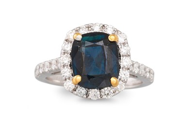 Lot 245 - A SAPPHIRE AND DIAMOND CLUSTER RING, the...