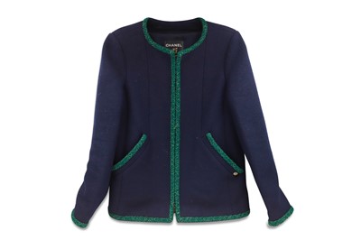 Lot 523 - A CHANEL MERINO WOOL JACKET, green lurex trim,...