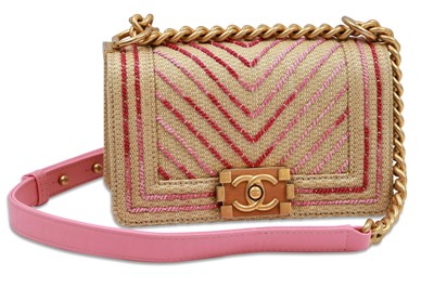 Lot 524 - A CHANEL SMALL RAFFIA BOY BAG, metallic pink...