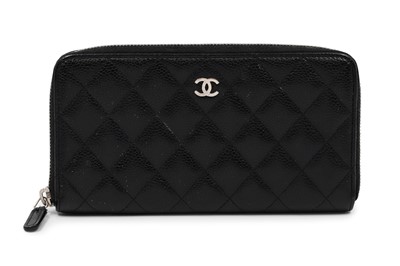 Lot 528 - A CHANEL TIMELESS CLASSIC LEATHER WALLET, zip...