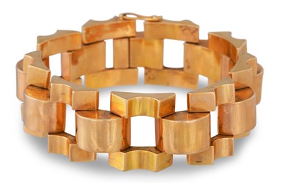 Lot 446 - A VINTAGE 18CT GOLD TANK BRACELET, shaped...