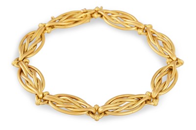 Lot 448 - AN 18CT GOLD BRACELET, knotted form, French...