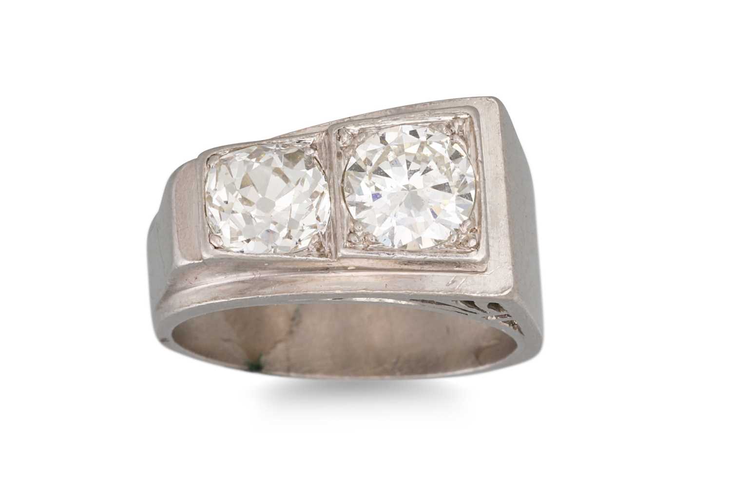 Lot 460 - A RETRO TWO STONE DIAMOND RING, the old cut...