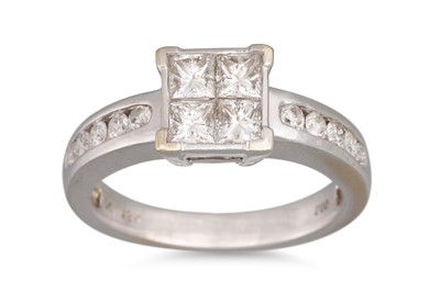 Lot 437 - A DIAMOND CLUSTER RING, set with four princess...