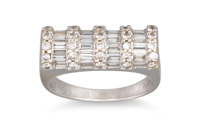 Lot 438 - A DIAMOND CLUSTER RING, roll top set with...