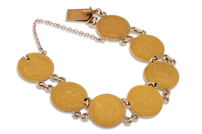 Lot 110 - A GOLD BRACELET, set with seven late 19th...