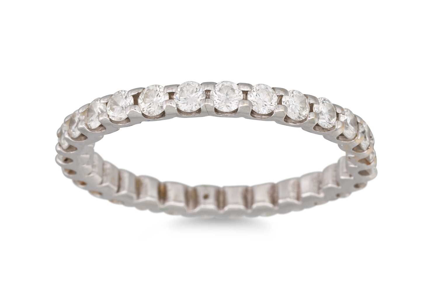 Lot 312 - A DIAMOND FULL ETERNITY RING, the round...