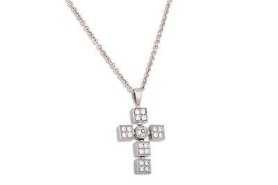 Lot 279 - A DIAMOND SET BULGARI CROSS PENDANT, on a...